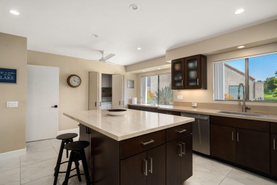 Rare end unit with spectacular south-facing views of two lakes on Mission Hills Golf Club in California - for sale on GolfHomes.com, golf home, golf lot
