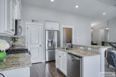 This well-maintained, move-in-ready home offers 6 bedrooms and 3 on Sage Lakes Municipal Golf Course in Idaho - for sale on GolfHomes.com, golf home, golf lot