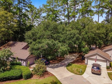 This lovely home is located in a cul-de-sac in charming Camden on Haile Plantation Golf and Country Club in Florida - for sale on GolfHomes.com, golf home, golf lot