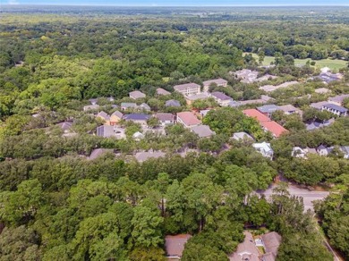 This lovely home is located in a cul-de-sac in charming Camden on Haile Plantation Golf and Country Club in Florida - for sale on GolfHomes.com, golf home, golf lot