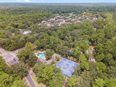 This lovely home is located in a cul-de-sac in charming Camden on Haile Plantation Golf and Country Club in Florida - for sale on GolfHomes.com, golf home, golf lot