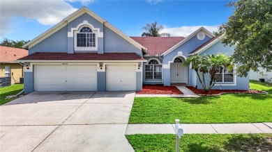 PRICE REDUCED!  Welcome to 34737 Arbor Green Place, a on The Links of Lake Bernadette in Florida - for sale on GolfHomes.com, golf home, golf lot