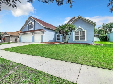 PRICE REDUCED!  Welcome to 34737 Arbor Green Place, a on The Links of Lake Bernadette in Florida - for sale on GolfHomes.com, golf home, golf lot