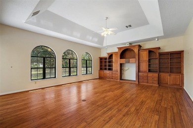 WECOME HOME!  The scenic views of this executive pool home will on Harbor Hills Country Club in Florida - for sale on GolfHomes.com, golf home, golf lot