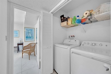 This second-floor unit in Hidden Woods of Deer Creek is a prime on Deer Creek Golf Club in Florida - for sale on GolfHomes.com, golf home, golf lot