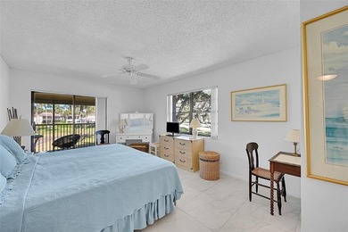This second-floor unit in Hidden Woods of Deer Creek is a prime on Deer Creek Golf Club in Florida - for sale on GolfHomes.com, golf home, golf lot