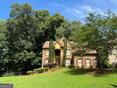 TERRIFIC OPPORTUNITY IN WOODMONT GOLF AND COUNTRY CLUB! on Woodmont Golf and Country Club in Georgia - for sale on GolfHomes.com, golf home, golf lot