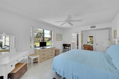 This second-floor unit in Hidden Woods of Deer Creek is a prime on Deer Creek Golf Club in Florida - for sale on GolfHomes.com, golf home, golf lot