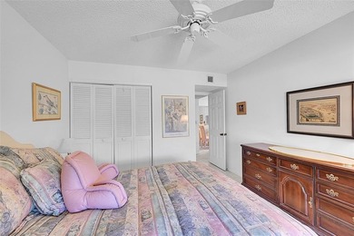 This second-floor unit in Hidden Woods of Deer Creek is a prime on Deer Creek Golf Club in Florida - for sale on GolfHomes.com, golf home, golf lot