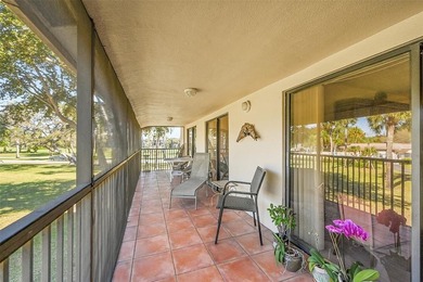 This second-floor unit in Hidden Woods of Deer Creek is a prime on Deer Creek Golf Club in Florida - for sale on GolfHomes.com, golf home, golf lot