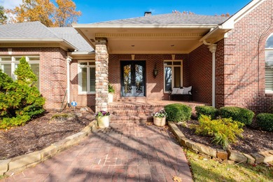 This beautiful CUSTOM home on the prestigious Founder's Course on Chenal Country Club - Bear Den Mountain in Arkansas - for sale on GolfHomes.com, golf home, golf lot