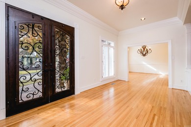 This beautiful CUSTOM home on the prestigious Founder's Course on Chenal Country Club - Bear Den Mountain in Arkansas - for sale on GolfHomes.com, golf home, golf lot