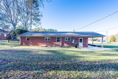 Step inside this charming 1960 brick ranch home located in on Cherryville Golf and  Country Club in North Carolina - for sale on GolfHomes.com, golf home, golf lot