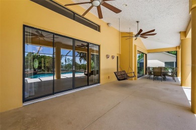 WECOME HOME!  The scenic views of this executive pool home will on Harbor Hills Country Club in Florida - for sale on GolfHomes.com, golf home, golf lot