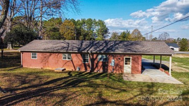 Step inside this charming 1960 brick ranch home located in on Cherryville Golf and  Country Club in North Carolina - for sale on GolfHomes.com, golf home, golf lot