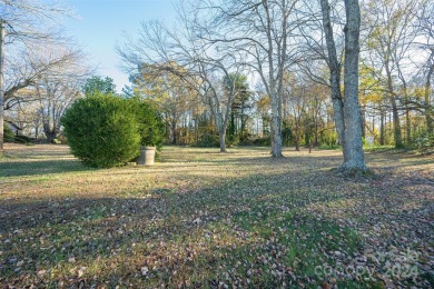 Step inside this charming 1960 brick ranch home located in on Cherryville Golf and  Country Club in North Carolina - for sale on GolfHomes.com, golf home, golf lot