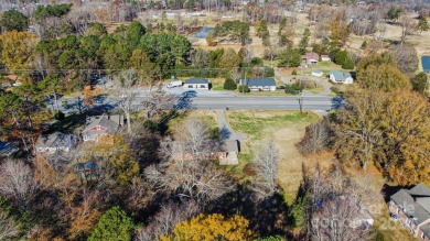 Step inside this charming 1960 brick ranch home located in on Cherryville Golf and  Country Club in North Carolina - for sale on GolfHomes.com, golf home, golf lot