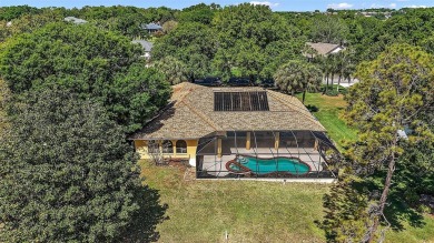 WECOME HOME!  The scenic views of this executive pool home will on Harbor Hills Country Club in Florida - for sale on GolfHomes.com, golf home, golf lot