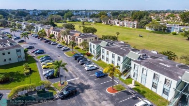 Well-maintained 2-bedroom, 2-bathroom unit located in Margate on Oriole Golf and Tennis Club in Florida - for sale on GolfHomes.com, golf home, golf lot