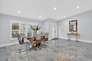 Totally renovated and a delight to see.  Picture perfect and on Boca Greens Country Club in Florida - for sale on GolfHomes.com, golf home, golf lot