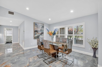 Totally renovated and a delight to see.  Picture perfect and on Boca Greens Country Club in Florida - for sale on GolfHomes.com, golf home, golf lot