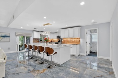 Totally renovated and a delight to see. Picture perfect and move on Boca Greens Country Club in Florida - for sale on GolfHomes.com, golf home, golf lot