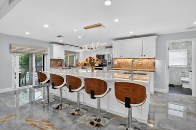 Totally renovated and a delight to see. Picture perfect and move on Boca Greens Country Club in Florida - for sale on GolfHomes.com, golf home, golf lot