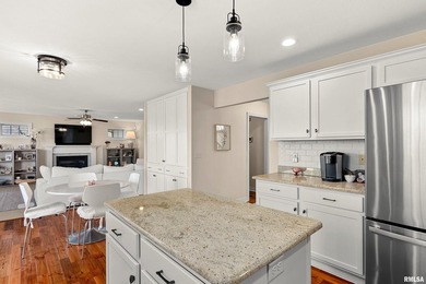 Welcome to this pristine 4-bedroom, 3.5 bathroom residence on WeaverRidge Golf Club in Illinois - for sale on GolfHomes.com, golf home, golf lot