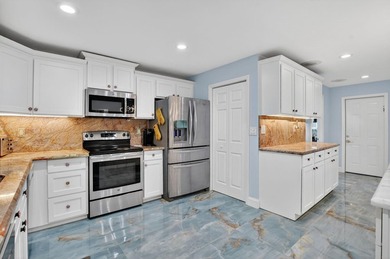 Totally renovated and a delight to see. Picture perfect and move on Boca Greens Country Club in Florida - for sale on GolfHomes.com, golf home, golf lot