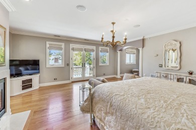 This freshly and professionally landscaped Mediterranean Mansion on Park Ridge Country Club in Illinois - for sale on GolfHomes.com, golf home, golf lot