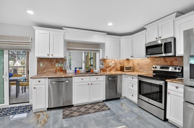 Totally renovated and a delight to see.  Picture perfect and on Boca Greens Country Club in Florida - for sale on GolfHomes.com, golf home, golf lot