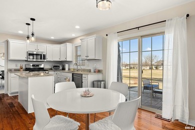 Welcome to this pristine 4-bedroom, 3.5 bathroom residence on WeaverRidge Golf Club in Illinois - for sale on GolfHomes.com, golf home, golf lot