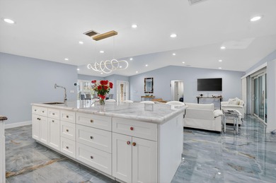 Totally renovated and a delight to see.  Picture perfect and on Boca Greens Country Club in Florida - for sale on GolfHomes.com, golf home, golf lot