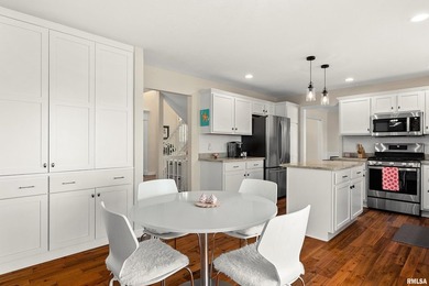 Welcome to this pristine 4-bedroom, 3.5 bathroom residence on WeaverRidge Golf Club in Illinois - for sale on GolfHomes.com, golf home, golf lot