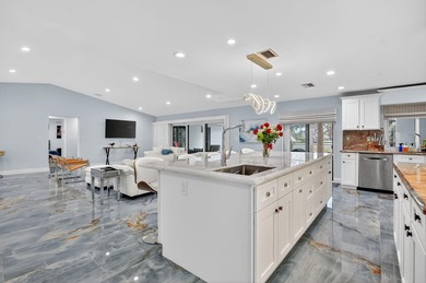 Totally renovated and a delight to see. Picture perfect and move on Boca Greens Country Club in Florida - for sale on GolfHomes.com, golf home, golf lot