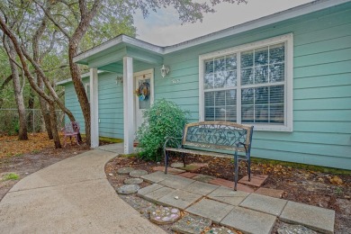 Nestled beneath large shade oak trees, this fully furnished on Rockport Country Club in Texas - for sale on GolfHomes.com, golf home, golf lot