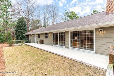 Discover the perfect blend of comfort, lifestyle, and location on Seven Lakes Country Club in North Carolina - for sale on GolfHomes.com, golf home, golf lot