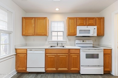 Discover this inviting Charleston-style home nestled in the on Brierwood Golf Club in North Carolina - for sale on GolfHomes.com, golf home, golf lot