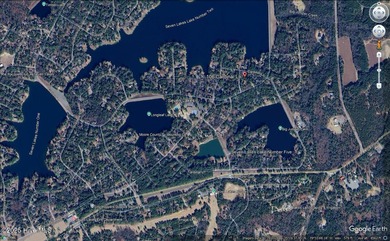 Discover the perfect blend of comfort, lifestyle, and location on Seven Lakes Country Club in North Carolina - for sale on GolfHomes.com, golf home, golf lot