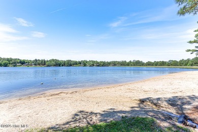 Discover the perfect blend of comfort, lifestyle, and location on Seven Lakes Country Club in North Carolina - for sale on GolfHomes.com, golf home, golf lot