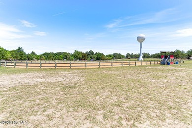 Discover the perfect blend of comfort, lifestyle, and location on Seven Lakes Country Club in North Carolina - for sale on GolfHomes.com, golf home, golf lot