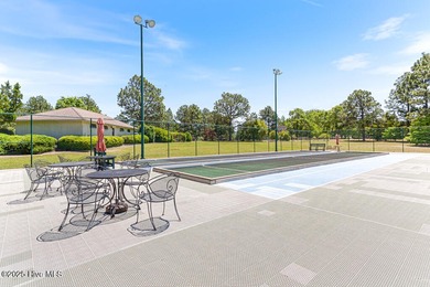 Discover the perfect blend of comfort, lifestyle, and location on Seven Lakes Country Club in North Carolina - for sale on GolfHomes.com, golf home, golf lot