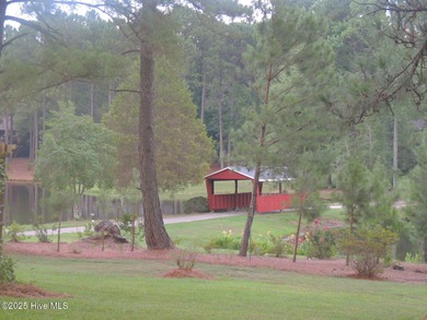 Discover the perfect blend of comfort, lifestyle, and location on Seven Lakes Country Club in North Carolina - for sale on GolfHomes.com, golf home, golf lot