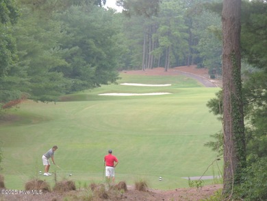 Discover the perfect blend of comfort, lifestyle, and location on Seven Lakes Country Club in North Carolina - for sale on GolfHomes.com, golf home, golf lot