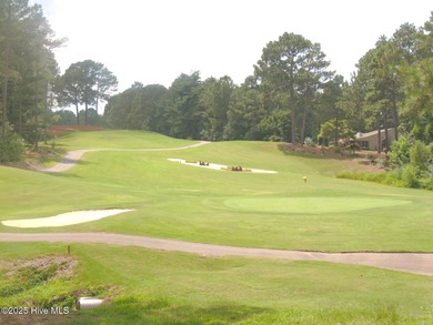 Discover the perfect blend of comfort, lifestyle, and location on Seven Lakes Country Club in North Carolina - for sale on GolfHomes.com, golf home, golf lot