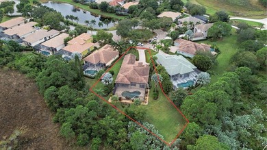 Tucked away on a rarely available, exceptionally private lot at on The Legacy Golf and Tennis Club in Florida - for sale on GolfHomes.com, golf home, golf lot