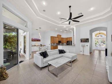 Tucked away on a rarely available, exceptionally private lot at on The Legacy Golf and Tennis Club in Florida - for sale on GolfHomes.com, golf home, golf lot