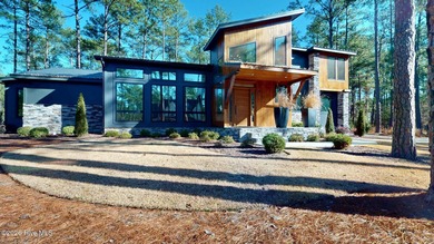 Experience the ultimate in Contemporary Living. This on Forest Creek Golf Club  in North Carolina - for sale on GolfHomes.com, golf home, golf lot