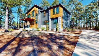 Experience the ultimate in Contemporary Living. This on Forest Creek Golf Club  in North Carolina - for sale on GolfHomes.com, golf home, golf lot