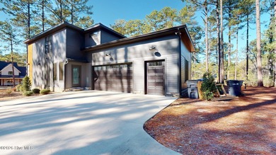 Experience the ultimate in Contemporary Living. This on Forest Creek Golf Club  in North Carolina - for sale on GolfHomes.com, golf home, golf lot